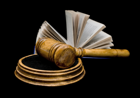 http://www.dreamstime.com/royalty-free-stock-photography-gavel-book-black-background-closeup-image28250587
